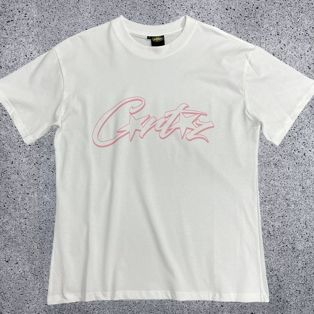Corteiz Pink Accent Star-Logo Graphic Tee - White & Pink Streetwear T-Shirt